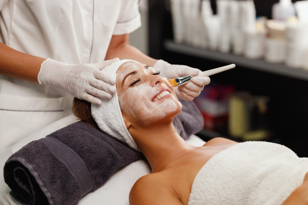 shot beautiful young woman getting facial mask treatment beauty salon